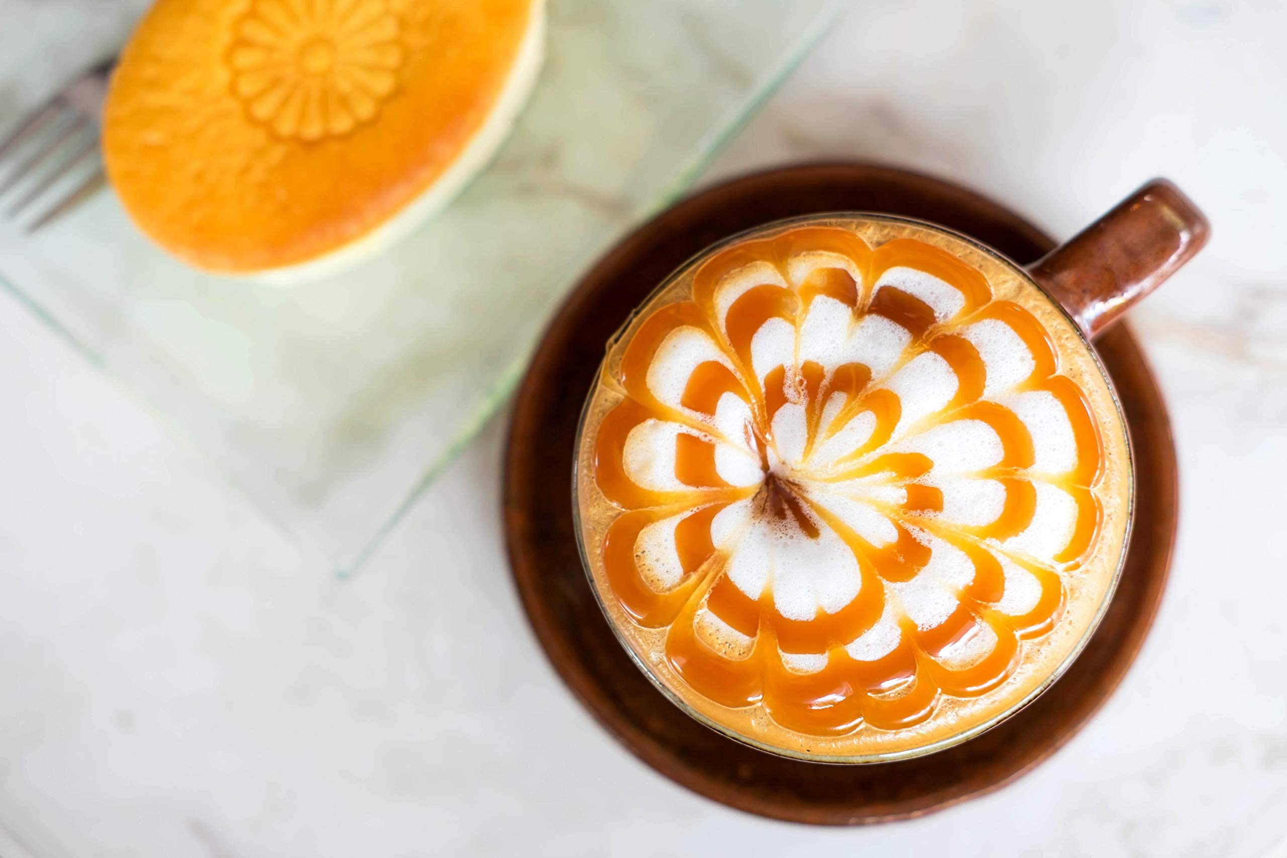 Hollander Classic Caramel Sauce drizzled over dessert for rich flavor.