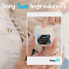 HolyCow herb-infused jojoba oil bottle nourishes skin daily.