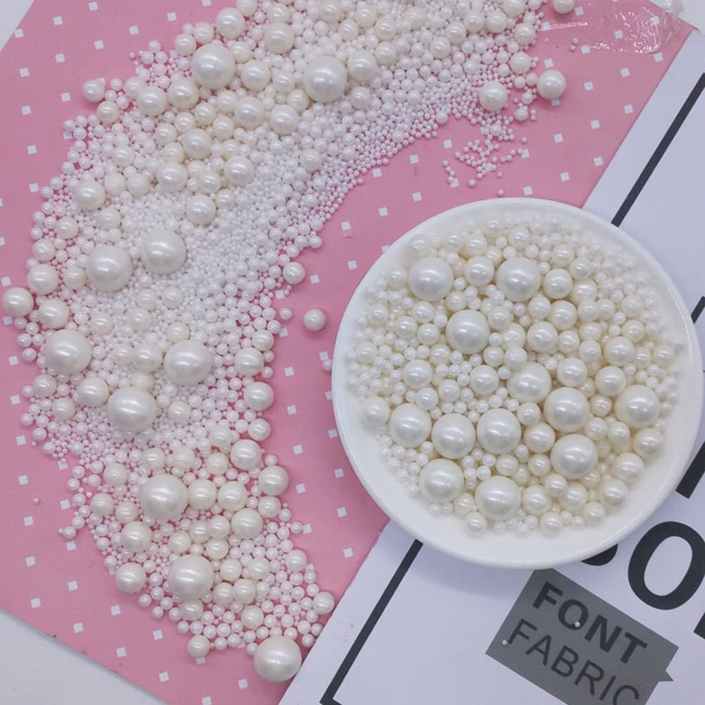 Homankit edible white sugar pearls on cookies offer quick, eye catching decor.
