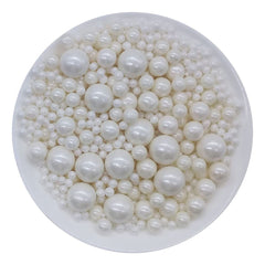 Homankit edible white sugar pearls on cake add elegant decoration and festive sparkle.