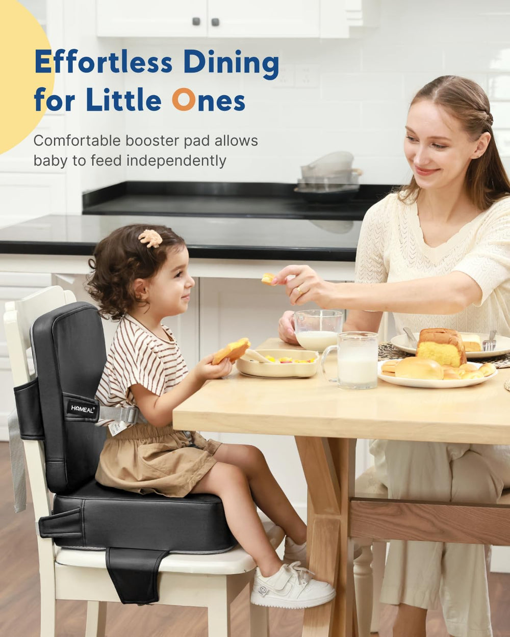 HOMEAL booster seat showing non-slip base keeping toddler steady at the dining table