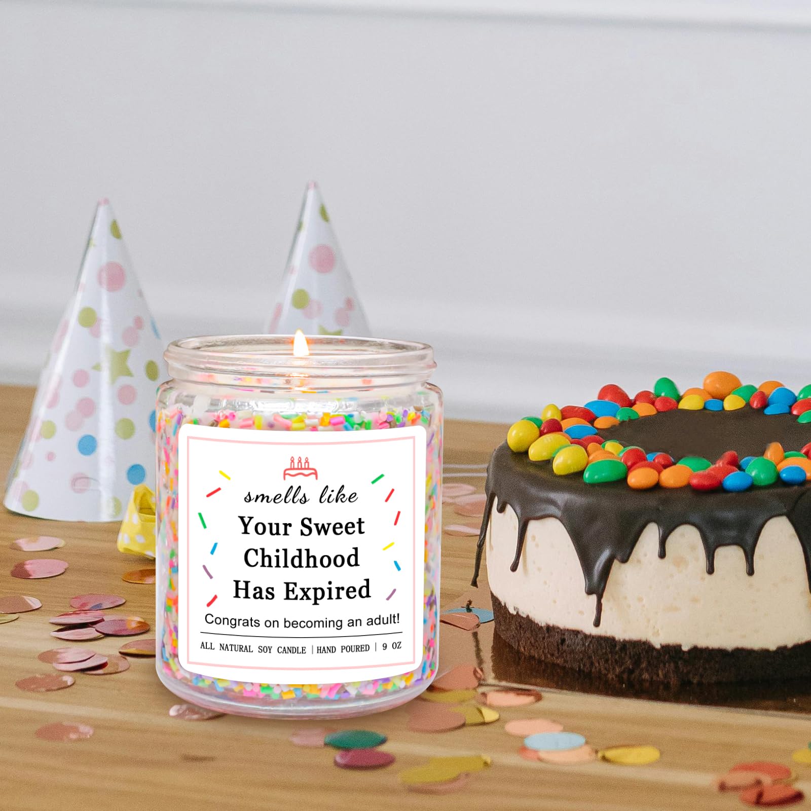 Homsolver vanilla birthday cake scented candle with sprinkles.