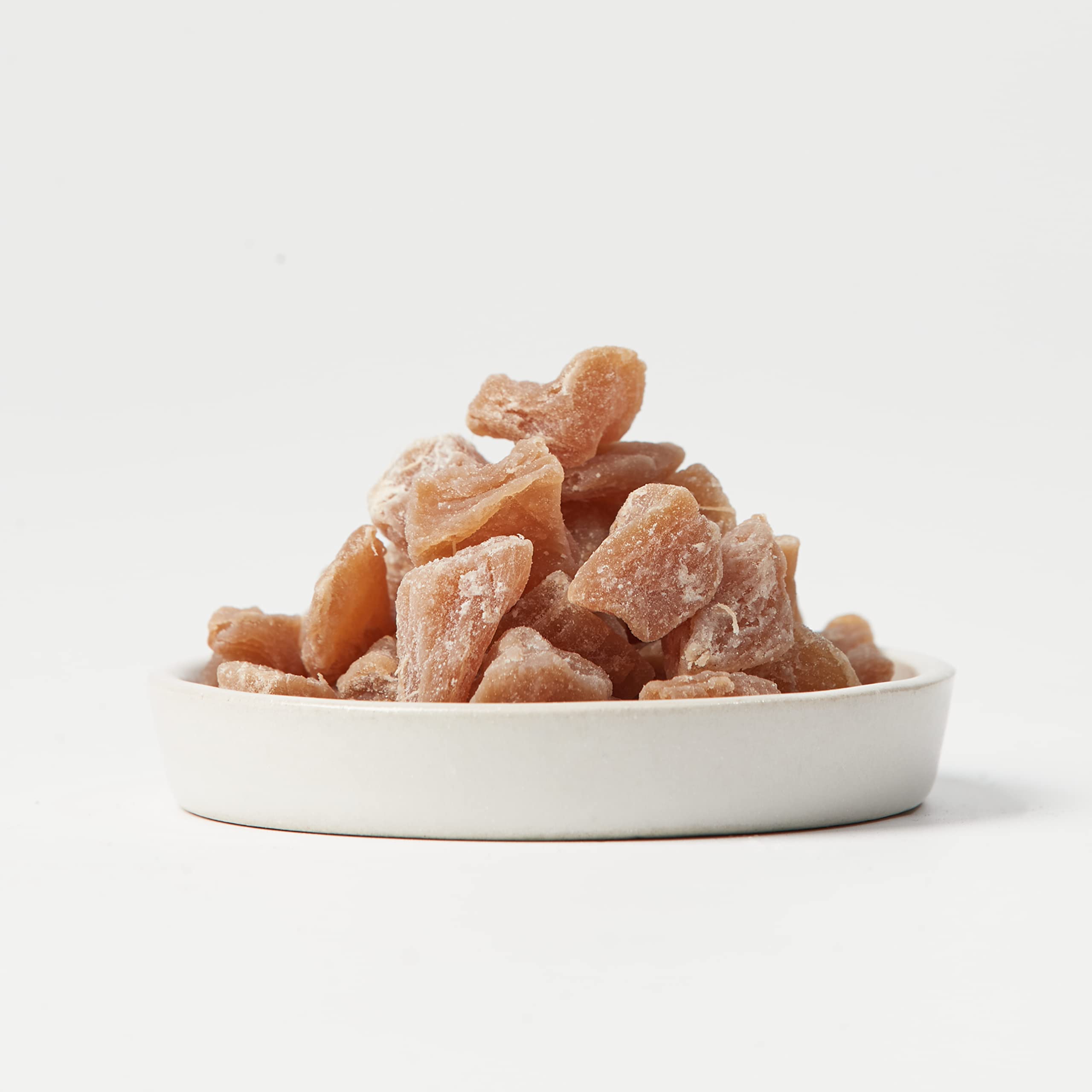 Homtiem Dried Ginger snacking ready image illustrates tasty, shareable treat.