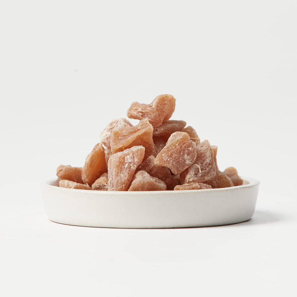Homtiem Dried Ginger snacking ready image illustrates tasty, shareable treat.
