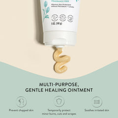 The Honest Company Healing Ointment applied to lips for moisture