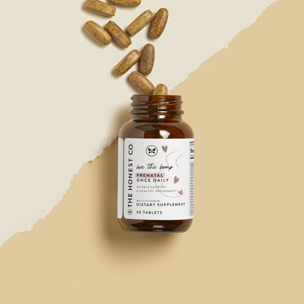Close-up of Love Bump tablets for convenient daily prenatal vitamins.