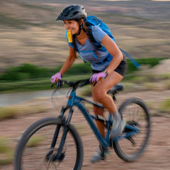 Honey Stinger Gold Energy Gel athlete running for fast, portable energy during endurance efforts.