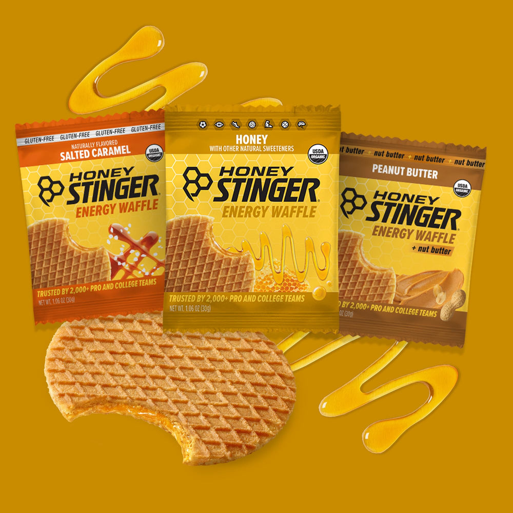Unwrapped Peanut Butter flavor Honey Stinger Organic Energy Waffle showing convenient single-serving snack.