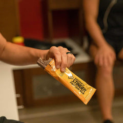Honey Stinger waffle in gym bag ready for pre workout fuel.