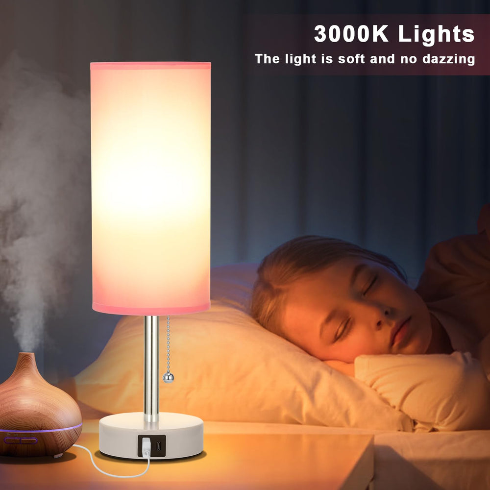 Hong-in pink lamp with soft shade creates warm ambiance