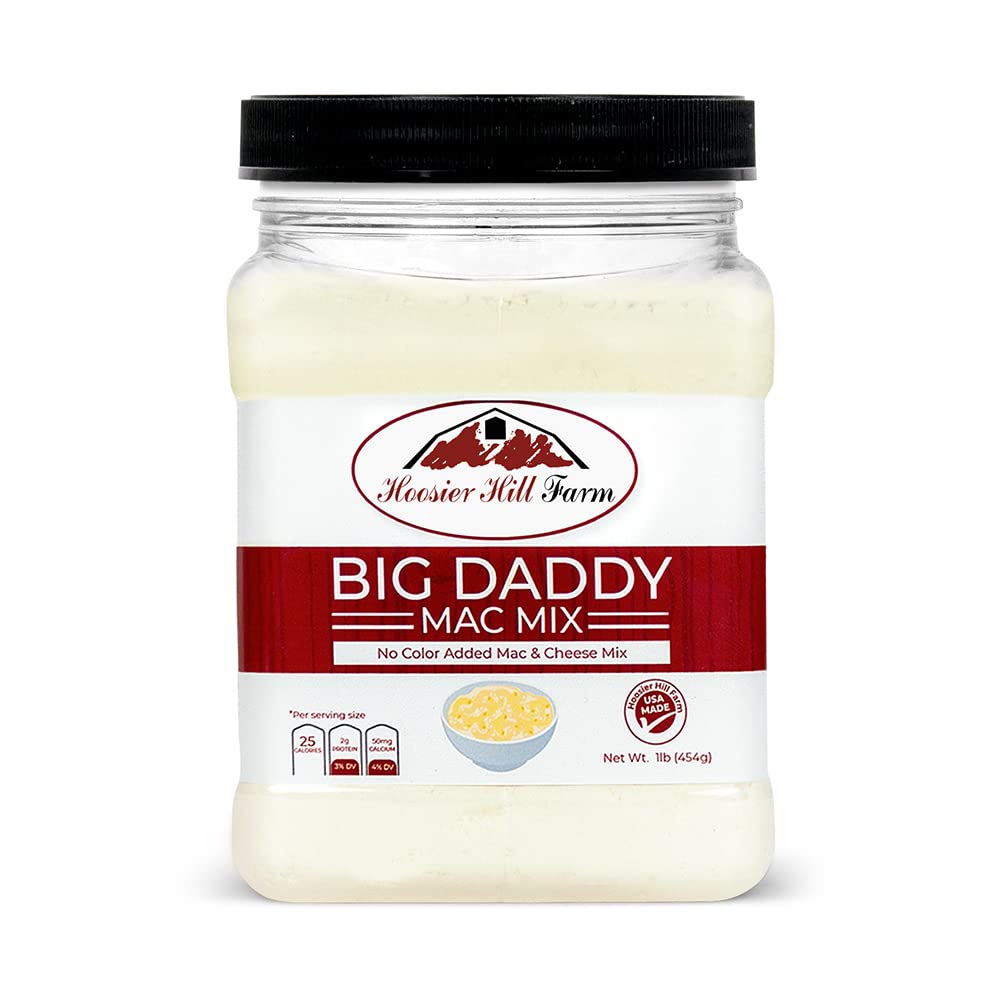 Spoon scooping Big Daddy Mac Mix for quick cheese sauce