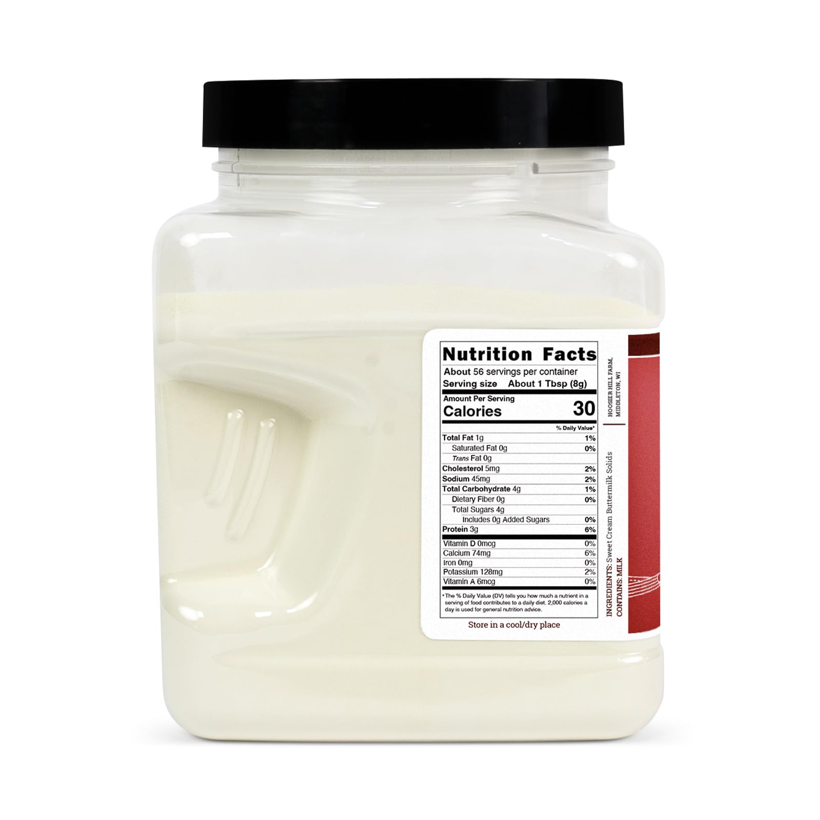Hoosier Hill Farm Buttermilk Powder being poured into a measuring cup