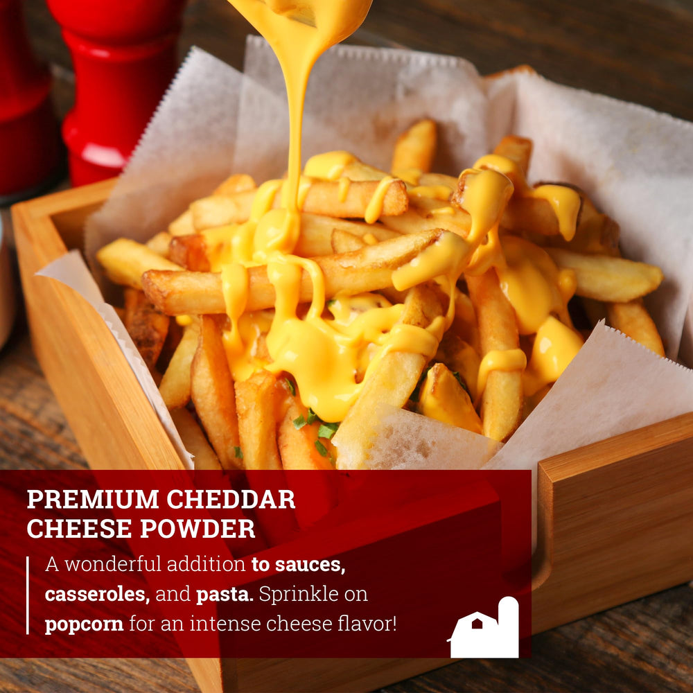 Scoop dispensing Hoosier Hill Farm cheddar powder for easy use