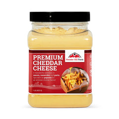 Hoosier Hill Farm Premium Cheddar Cheese Powder bottle ready to shake for richer flavor