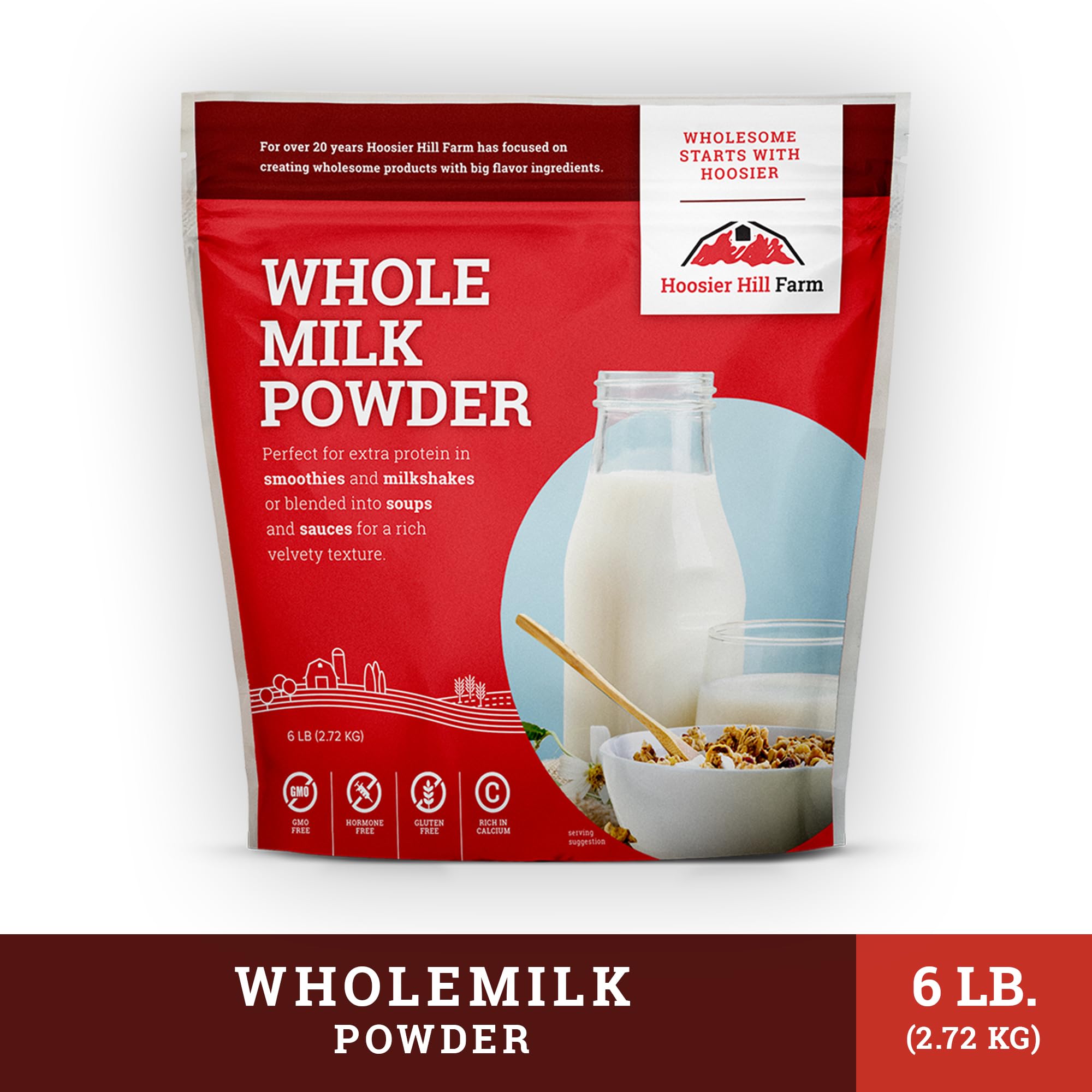 Pour reconstituted Hoosier Hill Farm milk into a glass for a creamy beverage