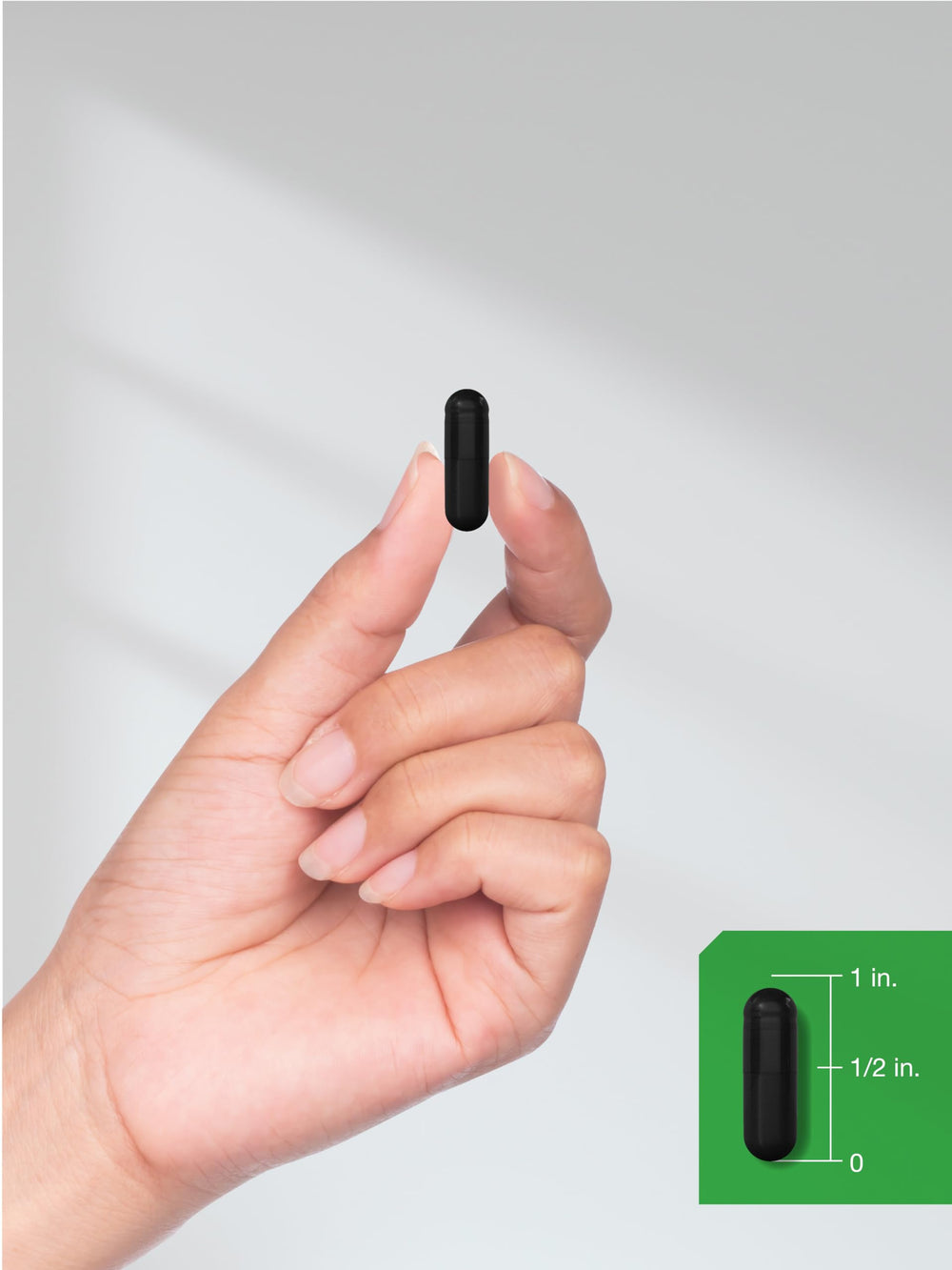 Horbäach Charcoal Pills bottle on travel setup illustrating portability