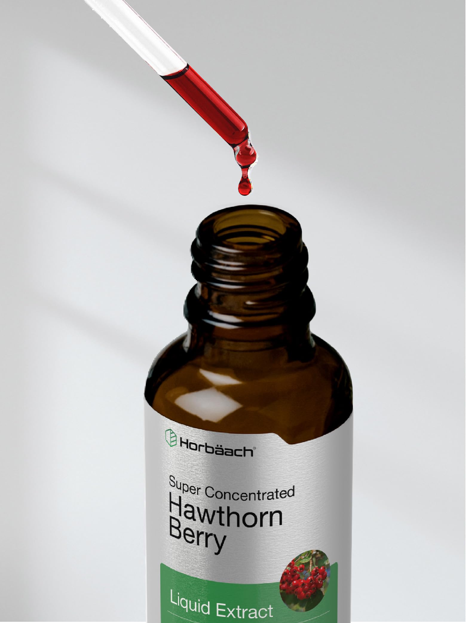Pour of Horbaach Hawthorn Berry Extract into water for convenient use