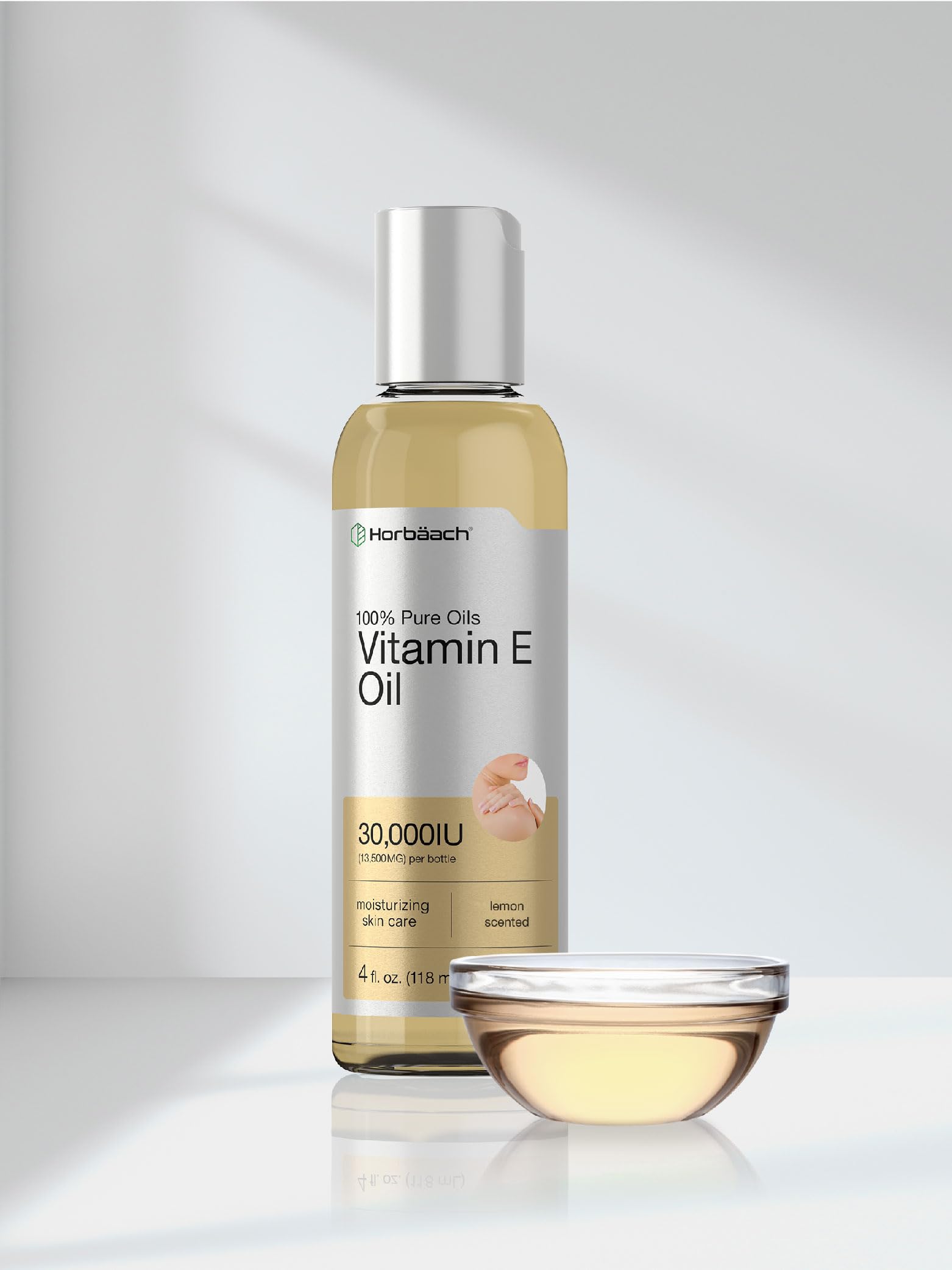 Non-GMO, vegetarian Horbaach Vitamin E Oil on clean surface.