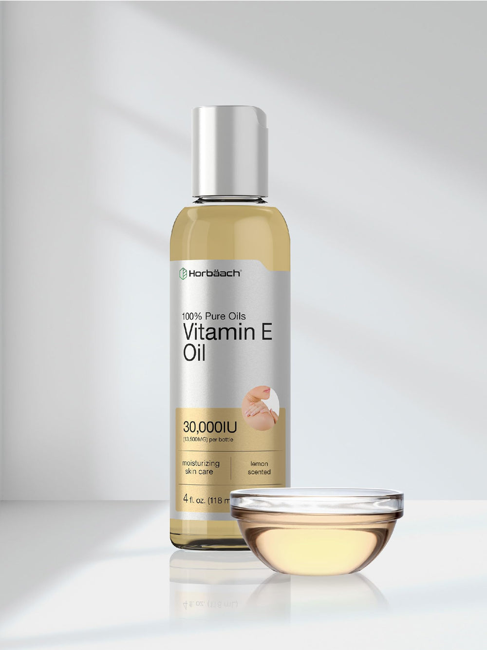 Non-GMO, vegetarian Horbaach Vitamin E Oil on clean surface.