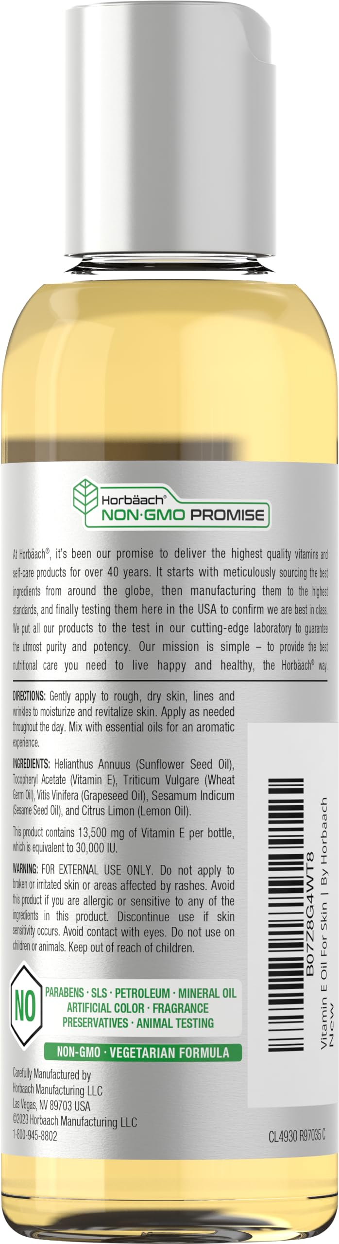 Texture close-up of Horbaach Vitamin E Oil gliding onto skin.