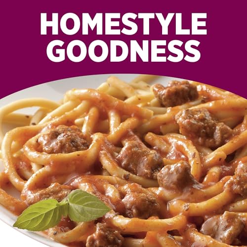 HORMEL COMPLEATS serving in bowl, steaming pasta with flavorful sauce.