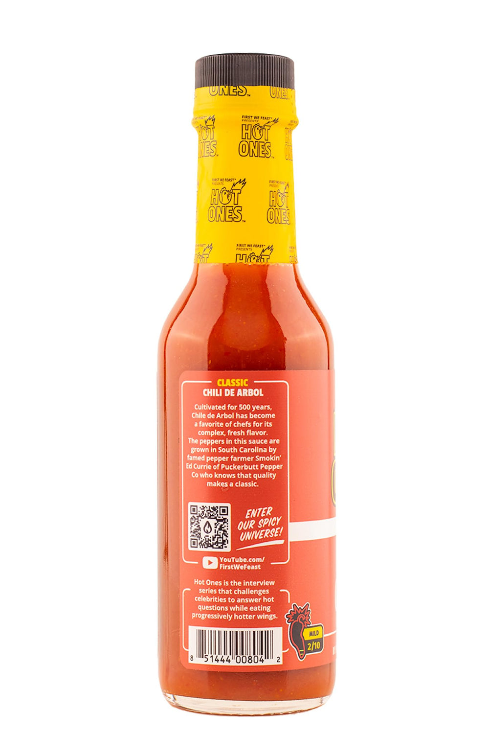 Hot Ones Classic bottle pour illustrating sauce texture ideal for toppings