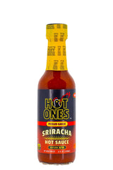 HOT ONES Pickled Garlic Sriracha bottle close-up shows vibrant color for bold flavor.