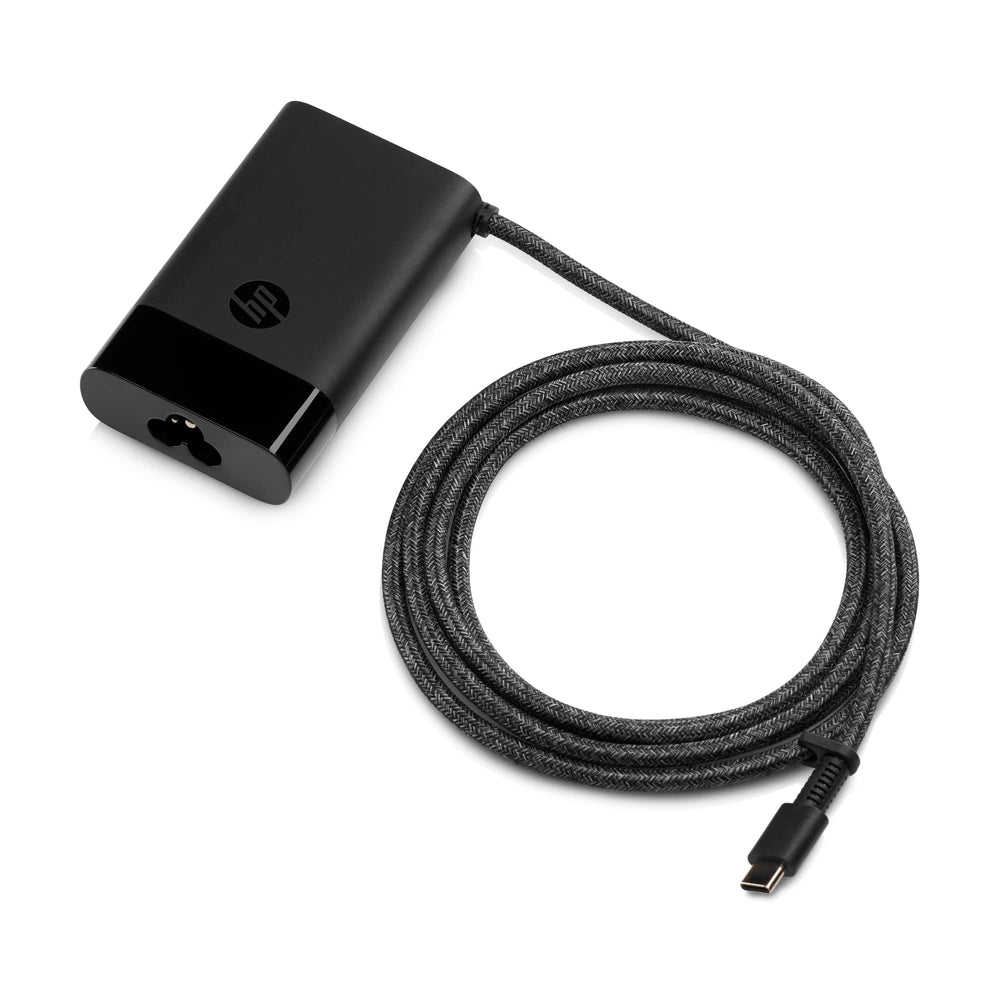 HP 65W USB-C charger side profile showing slim, travel-ready form.