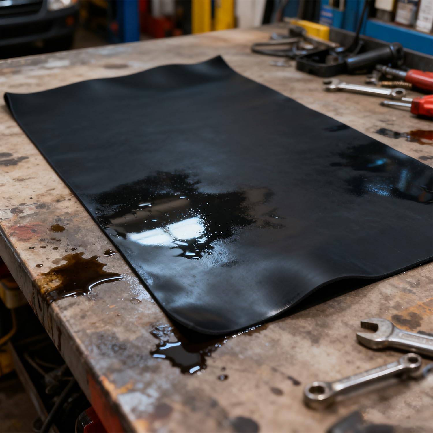 HTJZWG Neoprene sheet on a workbench as a non-slip mat.
