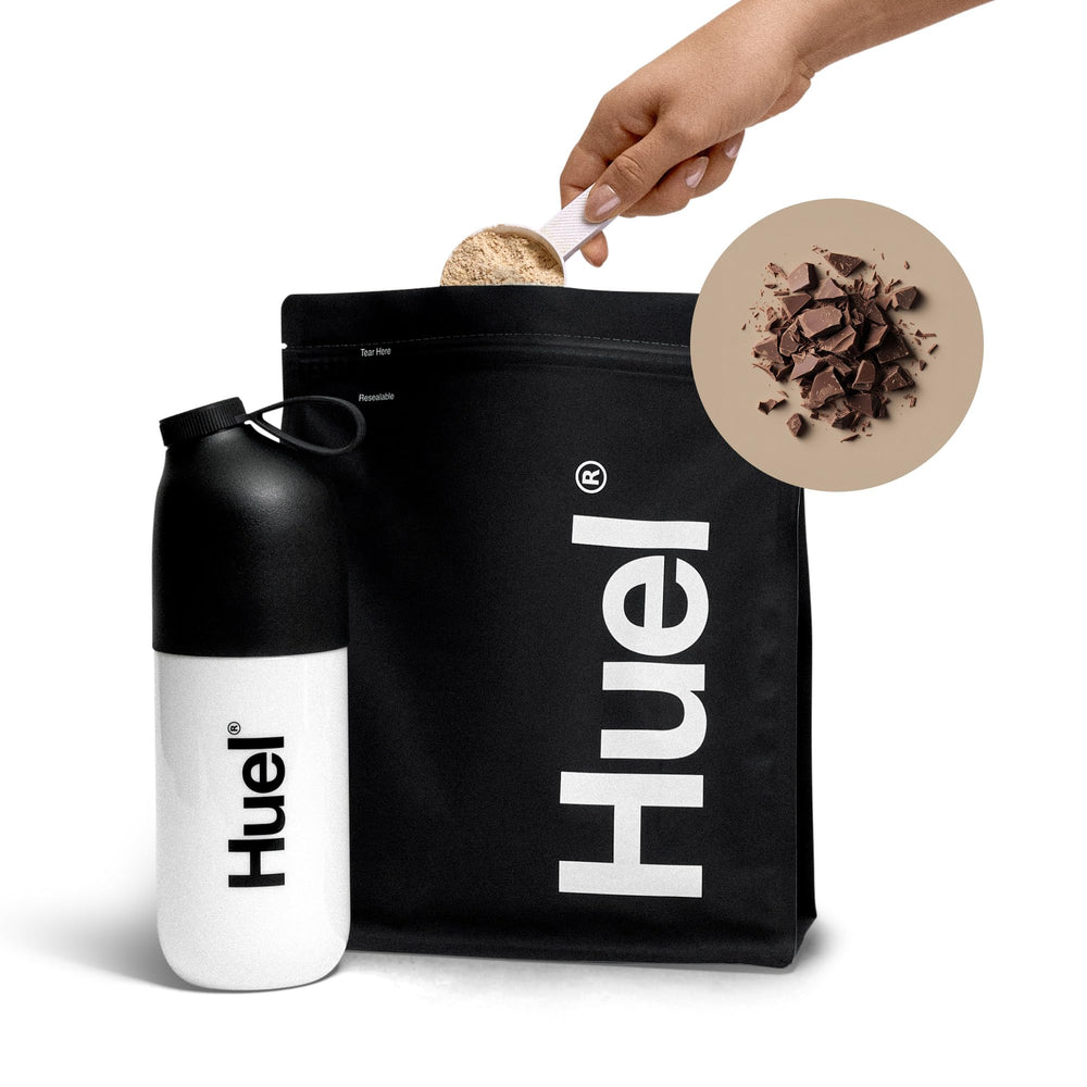 Huel Black Edition Chocolate serving at gym bag with shaker