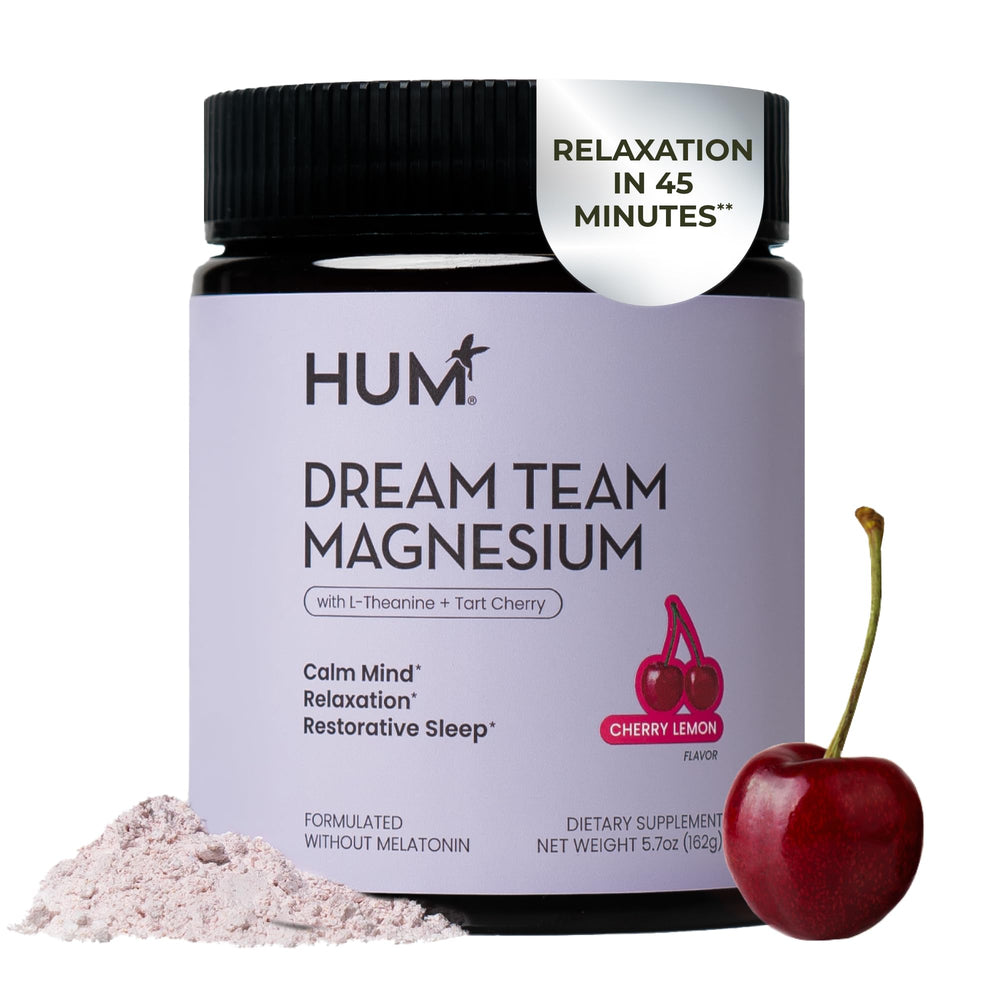 Hum Dream Team bottle of magnesium powder ready for a relaxing evening routine.
