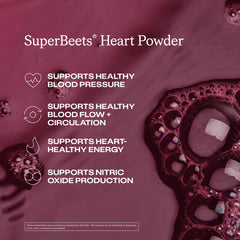 Glass of black cherry Humann SuperBeets drink after mixing.