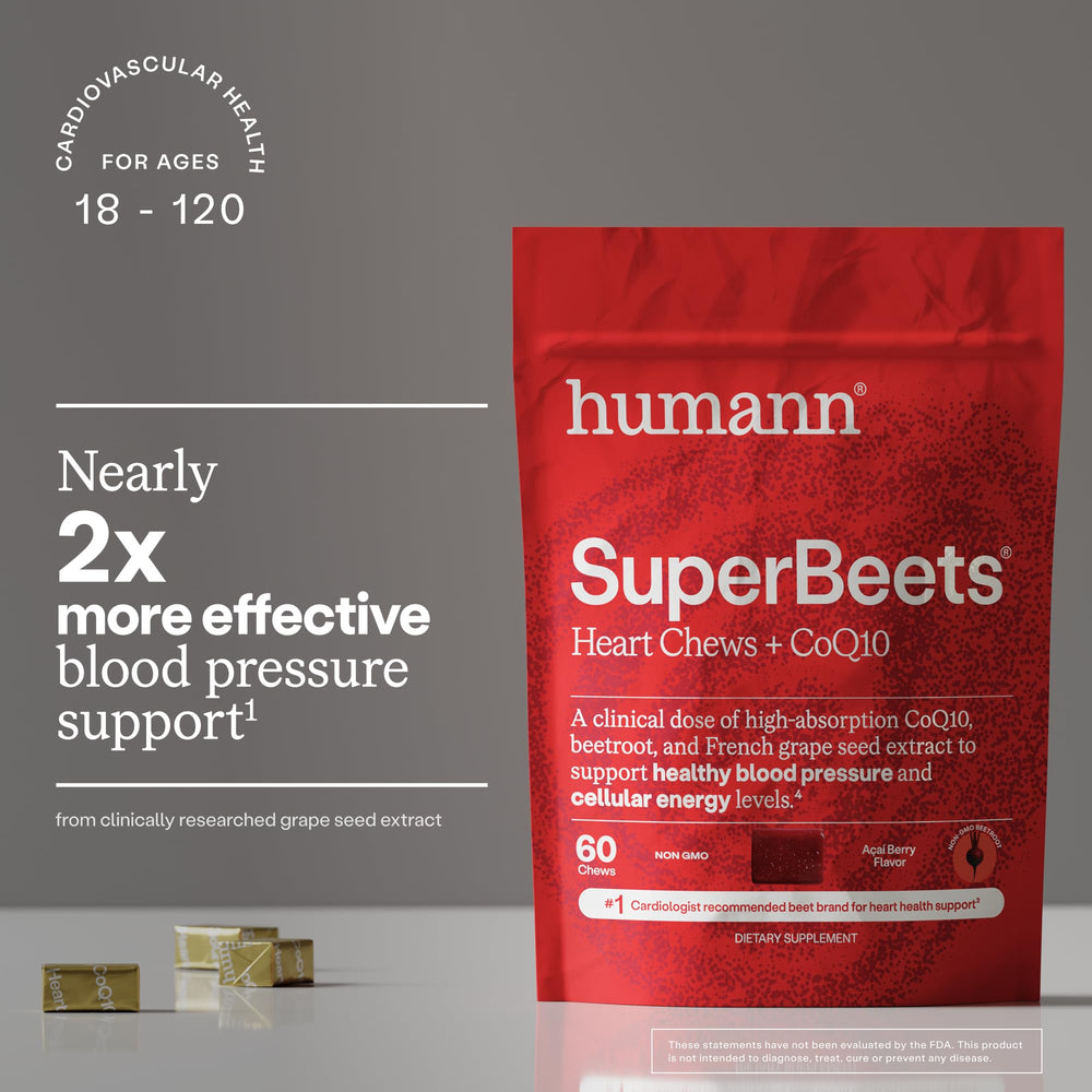 Pouring Humann SuperBeets Heart Chews from the bottle for on-the-go use.