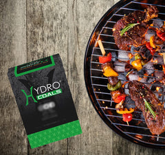 Hydro coconut charcoal cubes provide even heat across the grill.