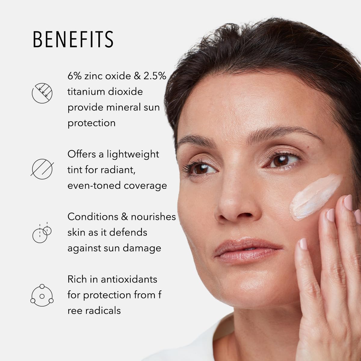 Hands applying HydroPeptide Solar Defense as the white cast fades