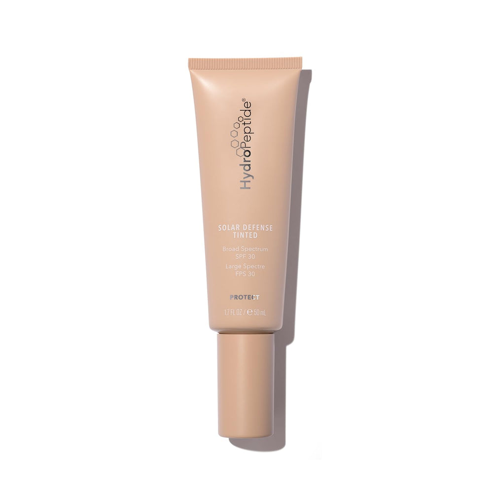 HydroPeptide Solar Defense tinted moisturizer bottle showing SPF 30 protection and glow