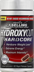 Hydroxycut Hardcore capsules pouring shot highlighting quick-release capsules