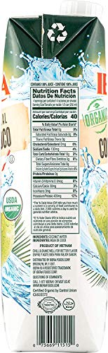 Iberia coconut water being poured for a refreshing moment.