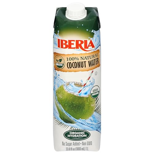 Chilled Iberia coconut water served in a glass for a quick pick me up.