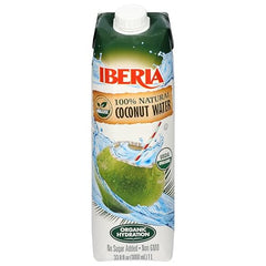 Chilled Iberia coconut water served in a glass for a quick pick me up.