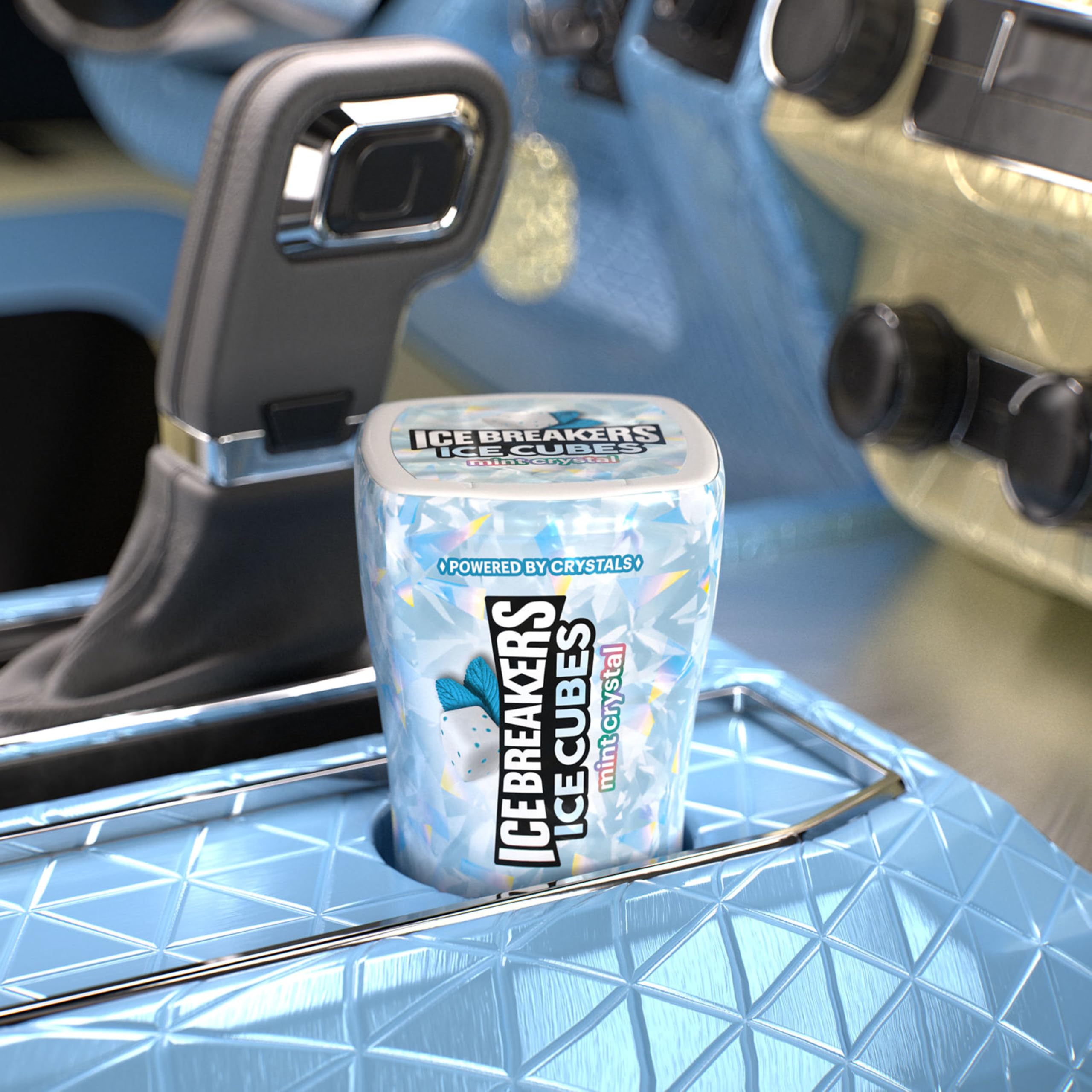 Ice Breakers Ice Cubes Mint Crystal bottle in backpack ready for fresh breath.