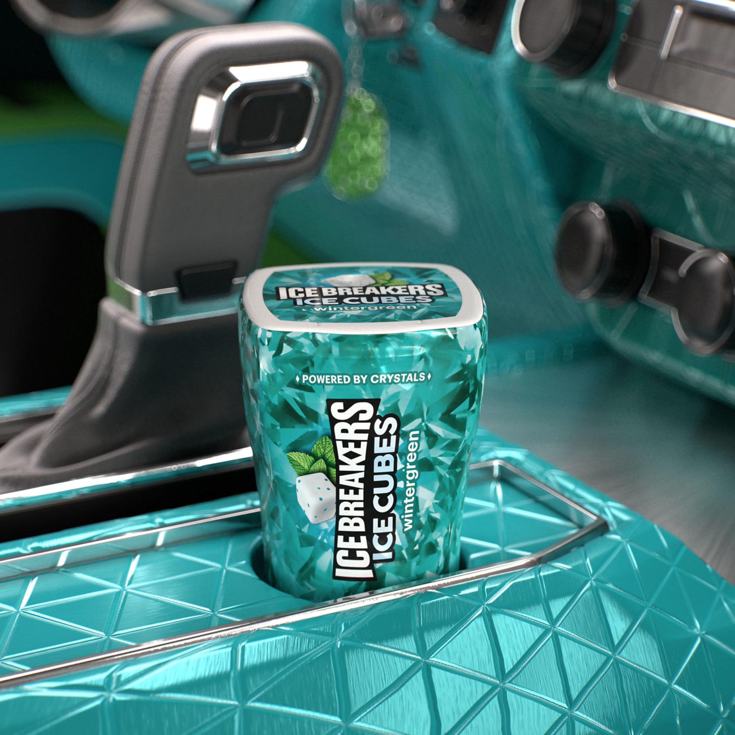 Ice Breakers Ice Cubes Wintergreen on desk for easy access during work.