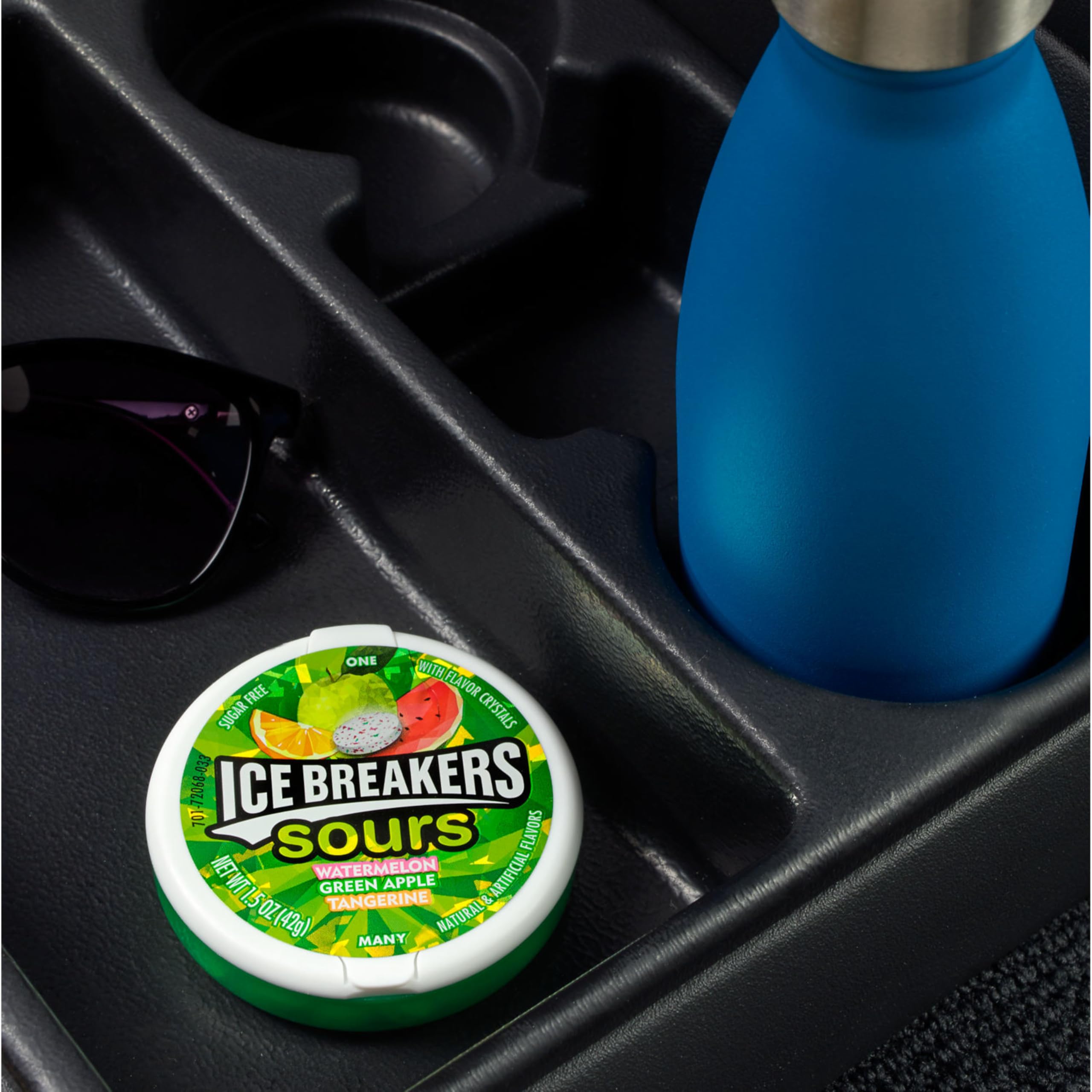 Ice Breakers Sours packaging detail shows dual-sided puck dispensing.
