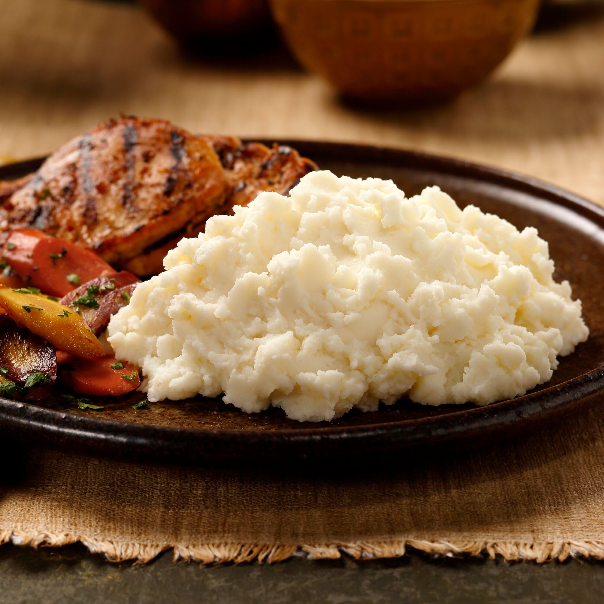 Kitchen scene with steam rising from prepared Idahoan mash