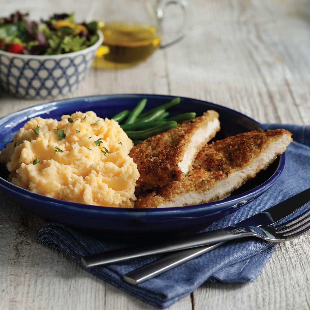 Idahoan family dinner setup with ready-to-serve mashed potatoes.