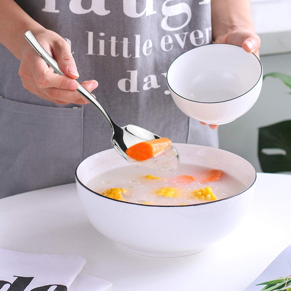 Idomy polished spoons reflecting light to enhance tableware aesthetic