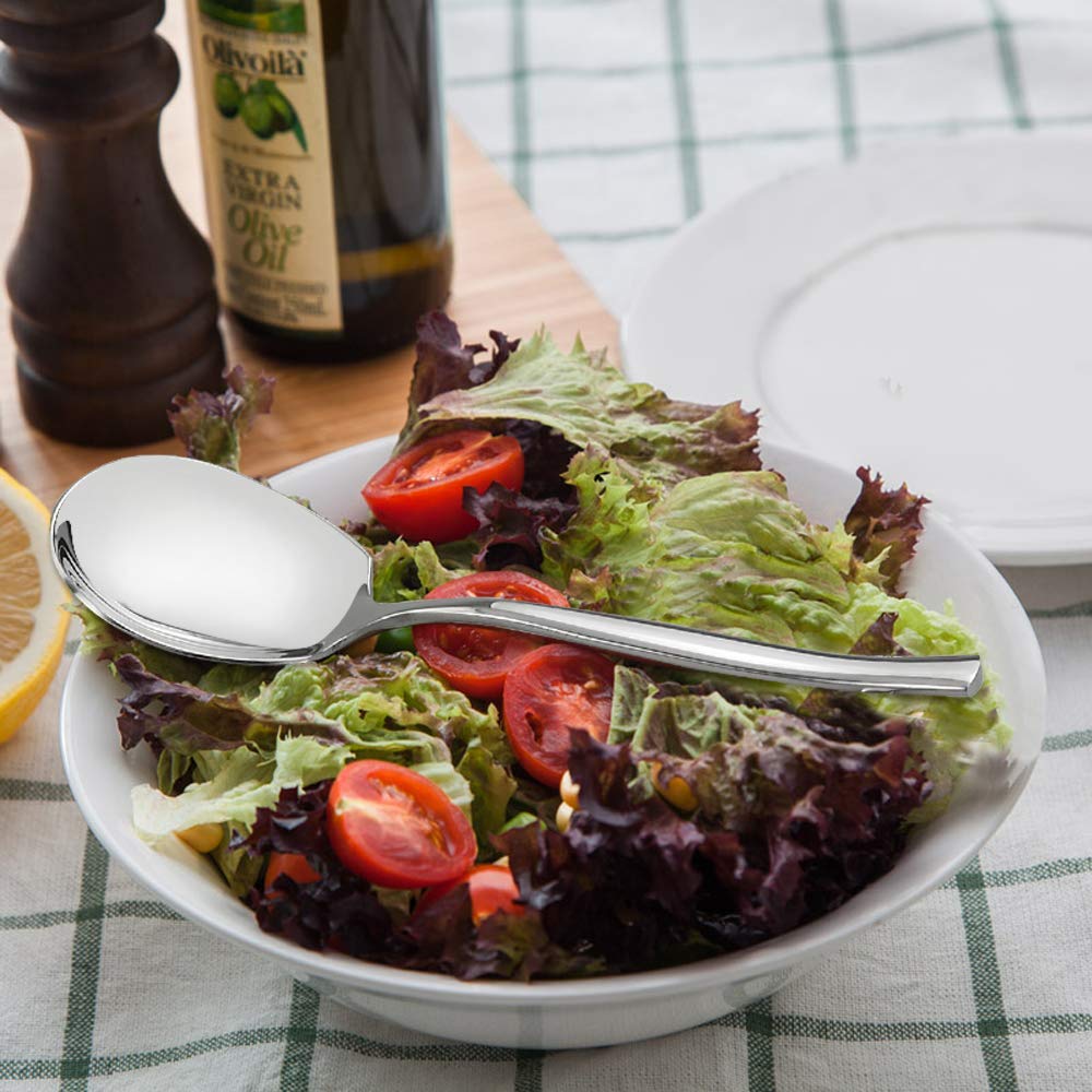 Idomy serving spoons on dining table highlighting a polished look