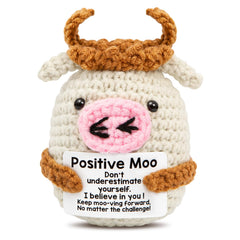 IIGLOWING mini positive crochet cow front face brightens a desk with cheerful vibes.