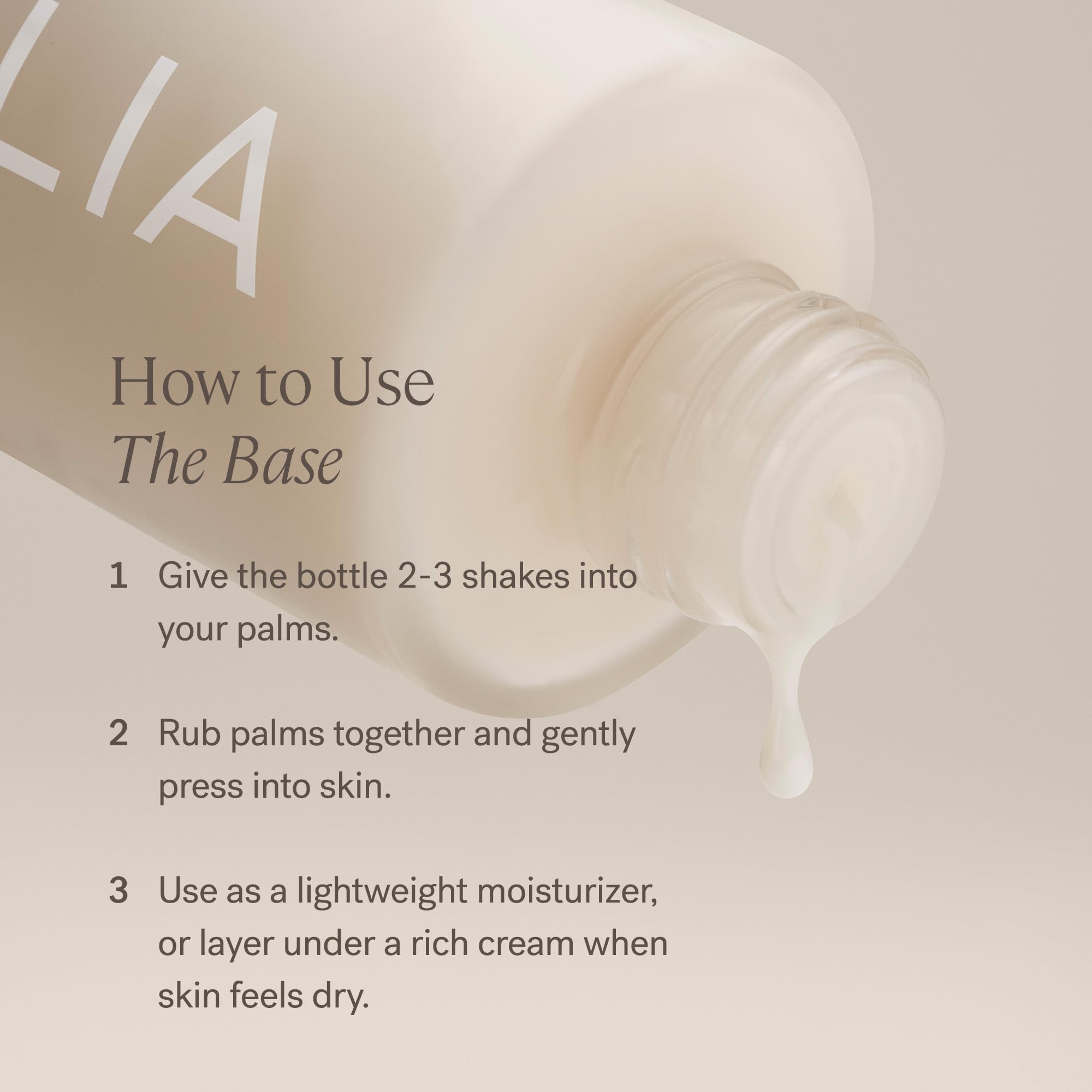 Vanity scene with ILIA The Base Face Milk Essence ready for daily use.