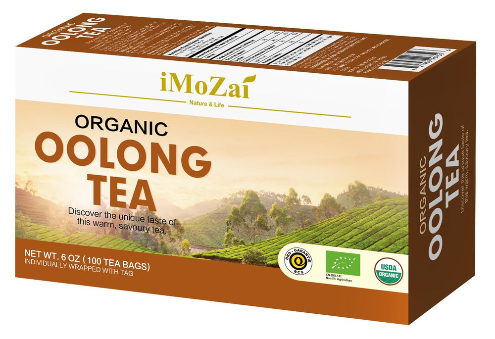 Steeped cup of Imozai Oolong Tea with a bright golden hue.
